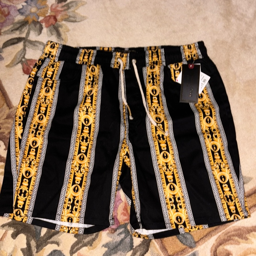 Men’s black and gold shorts